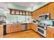 Updated kitchen with stainless steel appliances, granite countertops, and breakfast bar, perfect for entertaining at 426 Magnolia Ave, Anna Maria, FL 34216