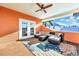 A cozy covered patio features comfortable seating and a colorful outdoor rug at 426 Magnolia Ave, Anna Maria, FL 34216