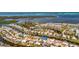 Expansive aerial view of a coastal community showcasing waterfront homes and picturesque canals at 4821 Mount Vernon Dr # 4821, Bradenton, FL 34210