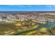 Scenic aerial view of a waterfront community featuring houses, canals, and lush greenery, with lakes in background at 4821 Mount Vernon Dr # 4821, Bradenton, FL 34210