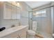 Well-lit bathroom featuring tiled shower, vanity and modern fixtures at 4821 Mount Vernon Dr # 4821, Bradenton, FL 34210