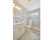 Bright bathroom featuring modern shower with tiled walls and glass door at 4821 Mount Vernon Dr # 4821, Bradenton, FL 34210