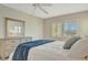 Calm bedroom with ample dresser storage and shuttered window at 4821 Mount Vernon Dr # 4821, Bradenton, FL 34210