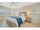 Comfortable bedroom with neutral colors and shuttered windows at 4821 Mount Vernon Dr # 4821, Bradenton, FL 34210