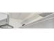 Walk-in closet featuring white shelving and clothes hangers at 4821 Mount Vernon Dr # 4821, Bradenton, FL 34210
