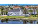 Aerial view of clubhouse, showcasing serene pond, and outdoor recreational space at 4821 Mount Vernon Dr # 4821, Bradenton, FL 34210