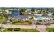 Scenic aerial view of clubhouse with pool, and lush landscaping with waterfront views at 4821 Mount Vernon Dr # 4821, Bradenton, FL 34210