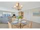 Charming dining area connected to the living room offering ample space for entertaining at 4821 Mount Vernon Dr # 4821, Bradenton, FL 34210