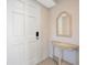 Clean entryway with tile floor and decorative mirror at 4821 Mount Vernon Dr # 4821, Bradenton, FL 34210