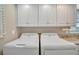 Laundry appliances featuring white cabinetry at 4821 Mount Vernon Dr # 4821, Bradenton, FL 34210