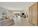 Inviting living room with a large window view, comfortable seating, and stylish decor at 4821 Mount Vernon Dr # 4821, Bradenton, FL 34210