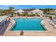Aerial view of a large community swimming pool perfect for recreation and relaxation at 4821 Mount Vernon Dr # 4821, Bradenton, FL 34210