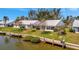 Waterfront property with private docks, lush landscaping, and serene water views at 4821 Mount Vernon Dr # 4821, Bradenton, FL 34210