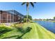 This home has a beautifully maintained backyard with a calming lake view, enhancing the outdoor experience at 4918 Avon Ln, Sarasota, FL 34238