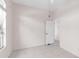 Bright bedroom boasts tile floors, neutral walls and ceiling fan plus a window for natural light at 4918 Avon Ln, Sarasota, FL 34238