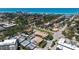 Charming neighborhood with palm trees, residences, and a distant view of the ocean at 525 Barcelona Ave # 207, Venice, FL 34285