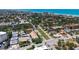 The drone image shows the property's neighborhood, proximity to the beach, and local amenities at 525 Barcelona Ave # 207, Venice, FL 34285