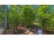 Landscaping with stone path, greenery and ambient lighting on the property at 5355 Anthony Ln, Sarasota, FL 34233