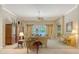 Spacious living room featuring neutral tones, elegant furnishings, and a light-filled ambiance at 5355 Anthony Ln, Sarasota, FL 34233