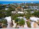 Overhead shot of a charming home with mature trees and landscaping near Siesta Key Beach at 5432 Cape Leyte Dr, Sarasota, FL 34242