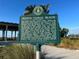 Sign with information about Siesta Public Beach's history and early development at 5432 Cape Leyte Dr, Sarasota, FL 34242