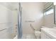 Clean bathroom features a shower-tub combination and accessibility handrails for added safety at 5521 Riverbluff Cir # V-10, Sarasota, FL 34231