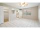Bright bedroom with tile floors, closet and access to the bathroom provides a private retreat at 5521 Riverbluff Cir # V-10, Sarasota, FL 34231