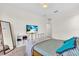 Inviting bedroom featuring a media center and a comfortable queen-sized bed at 5740 Sunflower Cir, Sarasota, FL 34238