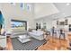 Open living area with high ceilings, lots of natural light, and views of the backyard at 5740 Sunflower Cir, Sarasota, FL 34238