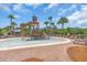 Community splash pad area with lounge chairs and a pirate-themed water feature at 5740 Sunflower Cir, Sarasota, FL 34238