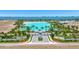 Aerial view of Aqua community amenities, showcasing the lagoon, beach, and landscaping at 5939 Redbay Blvd, Bradenton, FL 34210