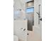 Elegant bathroom showcasing a walk-in shower with stylish tilework and modern fixtures at 5939 Redbay Blvd, Bradenton, FL 34210