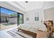 This spacious bedroom has a pool view, plenty of natural light and a modern design aesthetic at 5939 Redbay Blvd, Bradenton, FL 34210