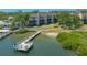 Stunning waterfront condos with a private fishing pier offer picturesque views and a serene coastal living experience at 6157 Midnight Pass Rd # B42, Sarasota, FL 34242