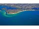 Panoramic aerial showcasing the stunning coastline and cityscape, with blue waters and beaches at 6157 Midnight Pass Rd # B42, Sarasota, FL 34242
