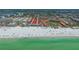 Aerial view of beach and nearby community with residences that offer convenient access to ocean views and sandy shores at 6157 Midnight Pass Rd # B42, Sarasota, FL 34242