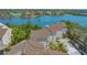 Exterior of multiple condominiums featuring private access to the waterway at 6157 Midnight Pass Rd # B42, Sarasota, FL 34242