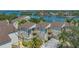 Waterfront condominiums overlooking beautiful landscape and dock at 6157 Midnight Pass Rd # B42, Sarasota, FL 34242