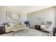 Inviting living room with neutral tones, comfortable seating, and stylish decor creates a relaxing atmosphere at 6157 Midnight Pass Rd # B42, Sarasota, FL 34242
