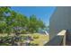 Picturesque water view from balcony overlooking the waterfront, boat dock, and picnic areas at 6157 Midnight Pass Rd # B42, Sarasota, FL 34242