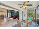 The screened lanai leads into the living room for seamless transition and enjoyment of the Florida lifestyle at 6330 Green Oak Cir, Bradenton, FL 34203