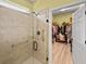 This bathroom features a glass-enclosed shower and walk in closet at 6713 Chester Trl, Bradenton, FL 34202