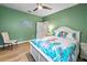 Bright bedroom features hardwood floors and neutral-toned walls at 6713 Chester Trl, Bradenton, FL 34202