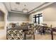 Common area with multiple tables and chairs for social gatherings and activities at 6713 Chester Trl, Bradenton, FL 34202