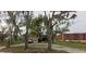 Charming single-Gathering home with mature landscaping and two-car garage at 6906 Simmons Loop, Riverview, FL 33578