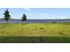 Expansive backyard offers beautiful lake views at 8134 Shore Lake Dr, Englewood, FL 34224