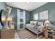 Comfortable bedroom featuring neutral tones, cozy decor, and natural light creating a serene retreat at 8134 Shore Lake Dr, Englewood, FL 34224