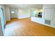 Open-concept living space with modern finishes, hardwood floors, and abundant natural light at 8297 Strasse Blvd, Punta Gorda, FL 33982