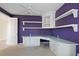 Home office with desk, cabinets, carpet and natural light at 9120 Willow Brook Dr, Sarasota, FL 34238