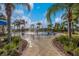 Community splash pad with water features and covered seating area at 12676 Sagewood Dr, Venice, FL 34293